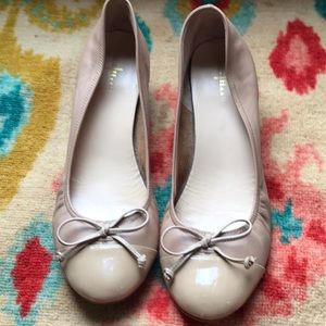 Cole Haan ballet style shoes with wedge heel.